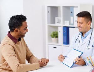 patient and doctor with clipboard linguava interpreters