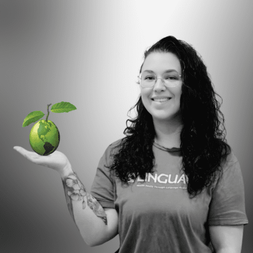 headshot of emily branchini linguist recruiter at linguava holding a guava