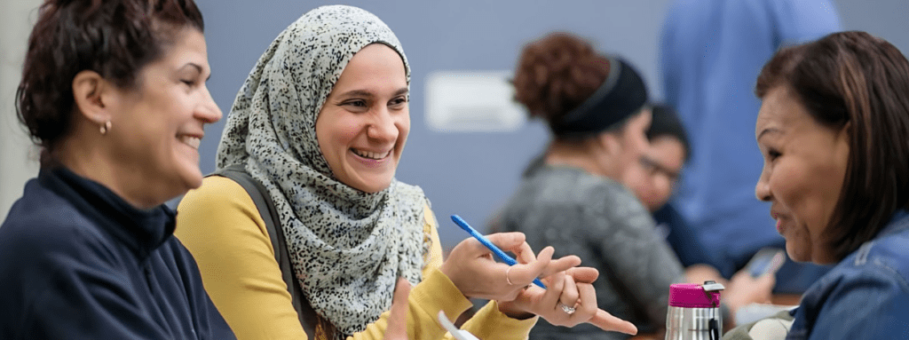 three diverse women talking how to stay calm as an interpreter